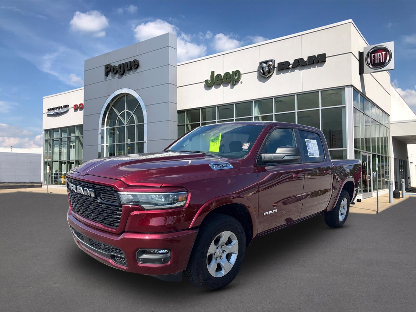2025 RAM 1500 Big Horn Crew Cab 4x4 5'7' Box in Delmonico Red Pearl Coat — front three-quarter view